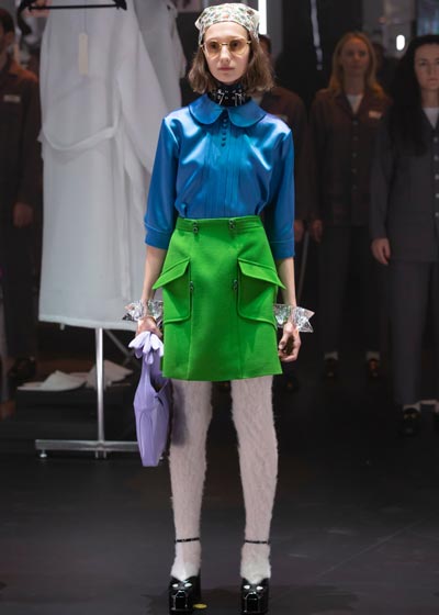 model wearing blue and green dress