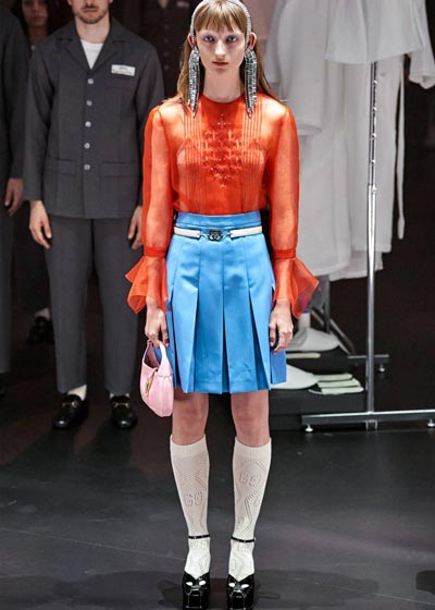 model wearing blue skirt